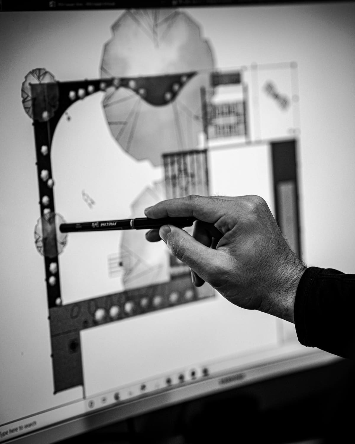 Designer reviewing a landscape design detail on screen