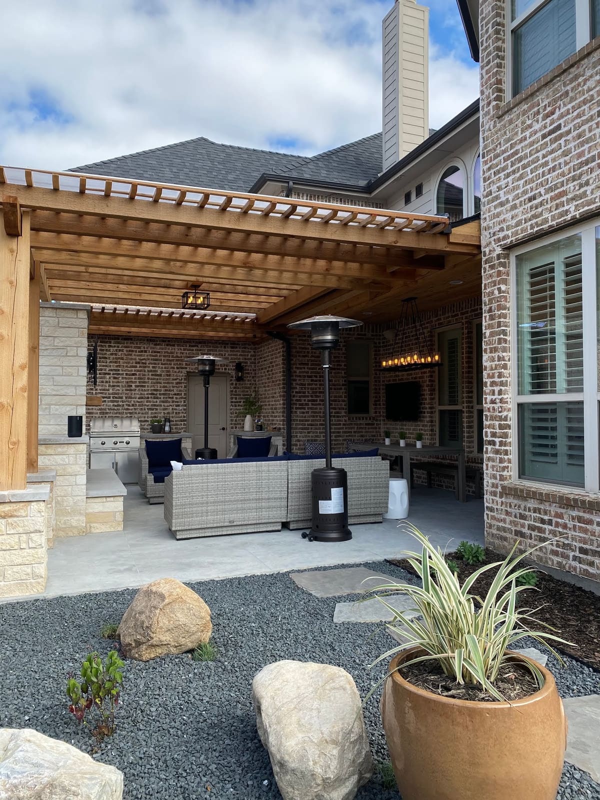 Patio pergola planter boulders