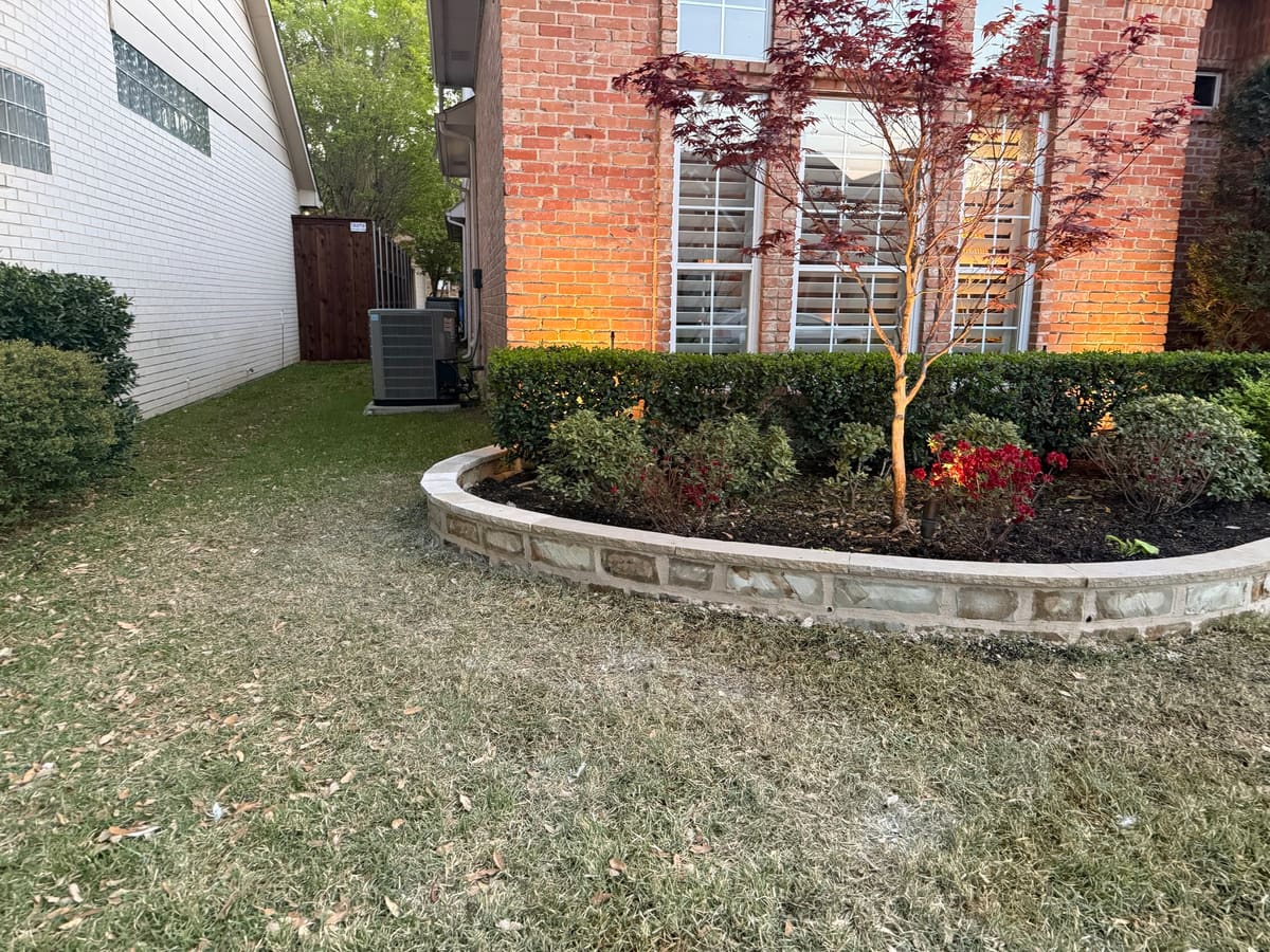 Curved stone landscape bed