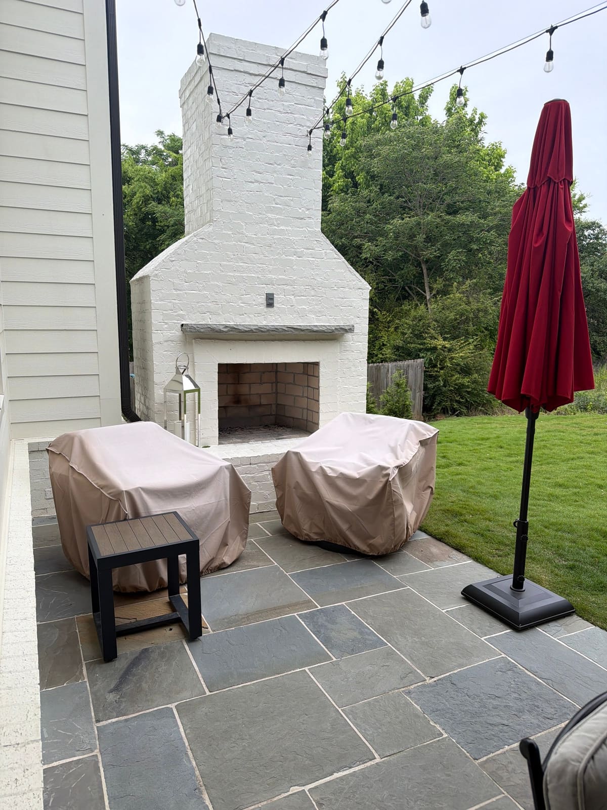 White outdoor fireplace patio