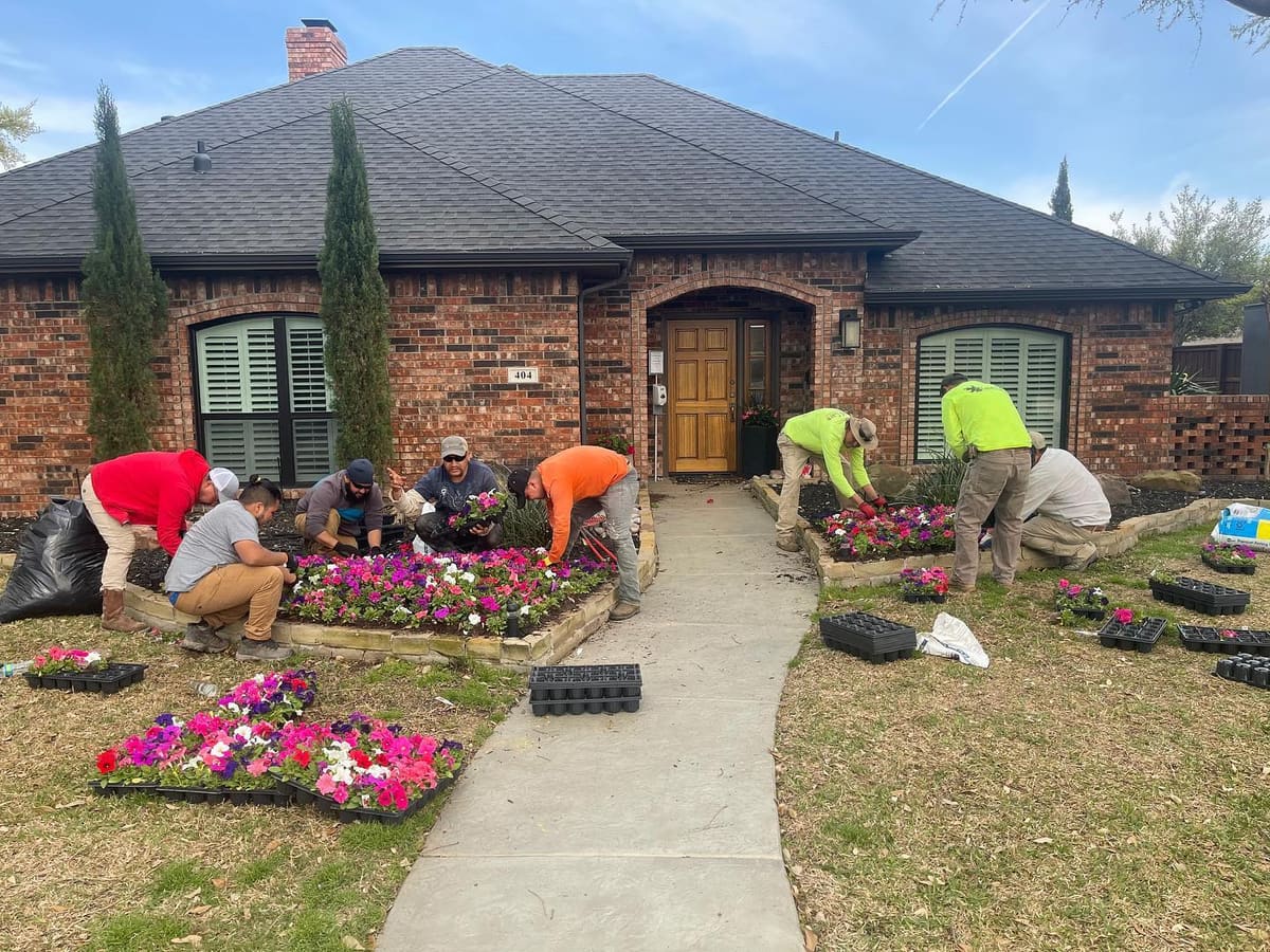 Crew installing seasonal flowers
