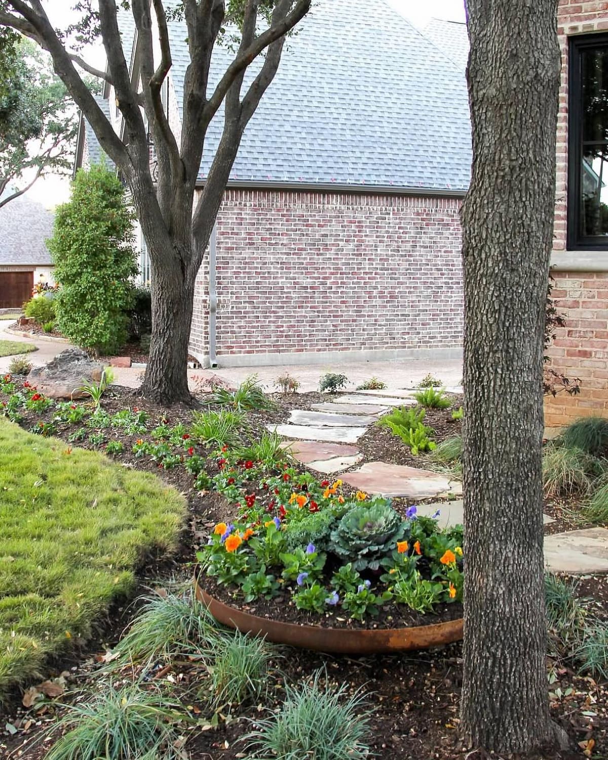 Shaded front bed stone edging